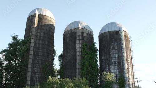 Dilapidated And Abandoned Farm Silos In Medford, New Jersey, USA. Low Angle photo