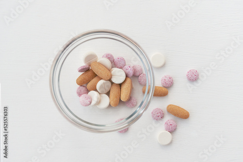 Medical various pills on light background. Close up top view.