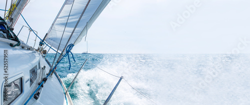 sailing boat on the sea banner design photo