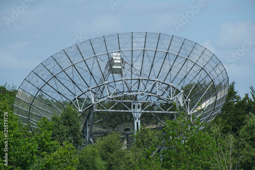 Westerbork, The Netherlands-July 2021; Close up of the dish of Westerbork Synthesis Radio Telescope (WSRT) deployed in linear array built on the site of former WW II Nazi detention and transit camp photo