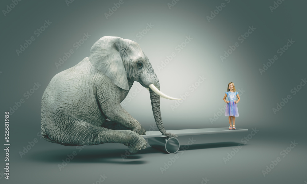 Little girl balancing on a plank with a elephant