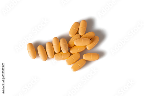 Image of orange pills isolated with shadows