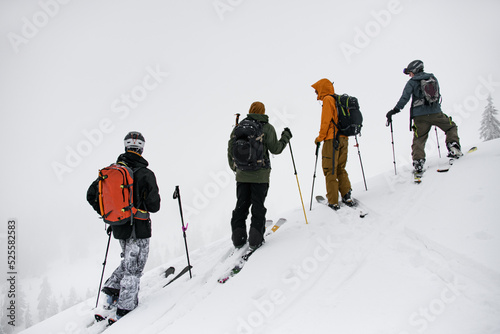 ski tour group of people walks to the top of the mountain Marmaros in the Carpathian mountains