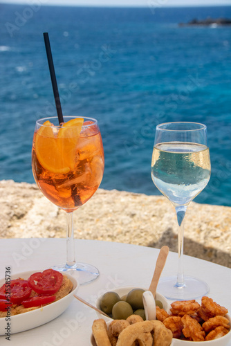 Fototapeta Naklejka Na Ścianę i Meble -  Aperitifs on the walls of Gallipoli