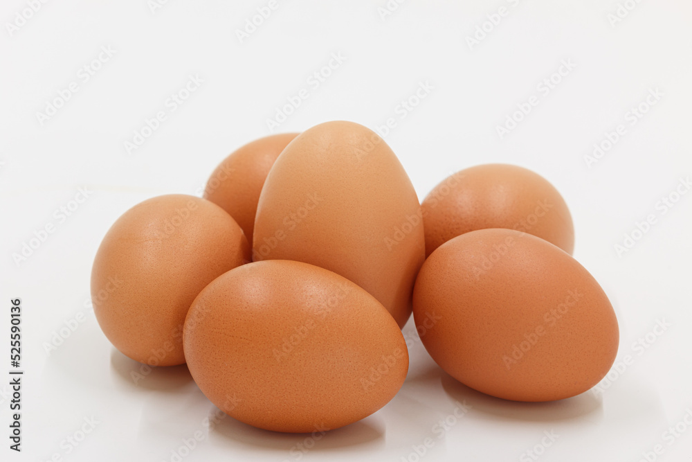 Six chicken egg raw on a white background. Six chicken egg raw on a white background.