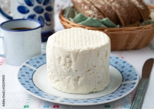 Artisanal fresh white cheese from Minas Gerais, Brazil with coffee and bread