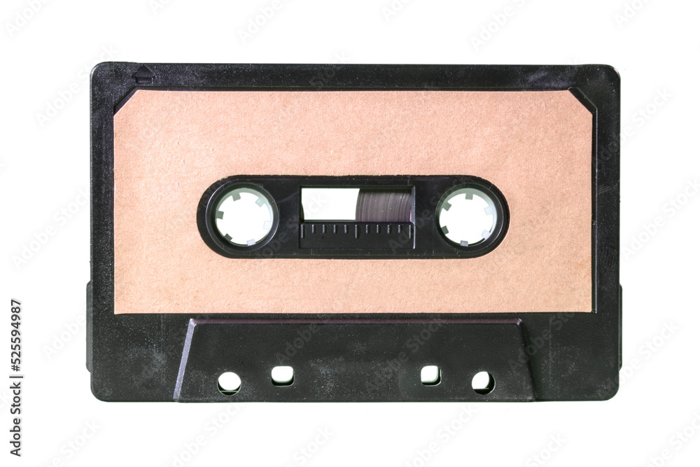 An old vintage cassette tape from the 1980s (obsolete music technology). Warm beige label, black plastic body. Isolated.
