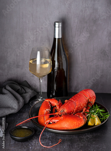 Food photography of lobster, wine, seafood, lemon, rosemary