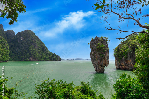 Island Phuket Thailand. Lovely rock in the middle of the ocean surrounded by mountains © Elias Bitar