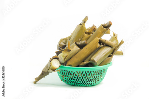 Group of Lontong in the plastic jar isolated white background.
