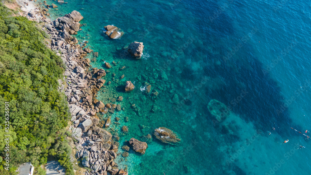 aerial view. sea, beautiful blue, rocks and lush greenery