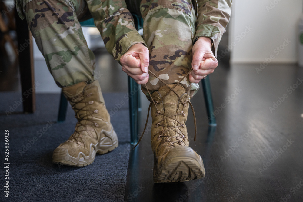 Air Force service member gets ready for work and leaves.