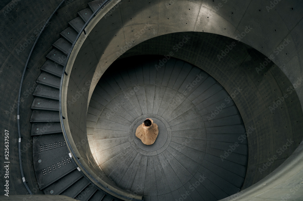 Fototapeta premium the woman is dancing by the stairs
