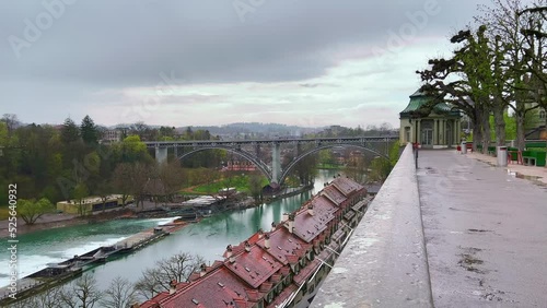 Panorama of River Aare with Kirchenfeldbrucke bridge, Mattenschleife weir and park on the opposite bank, Bern, Switzerland photo