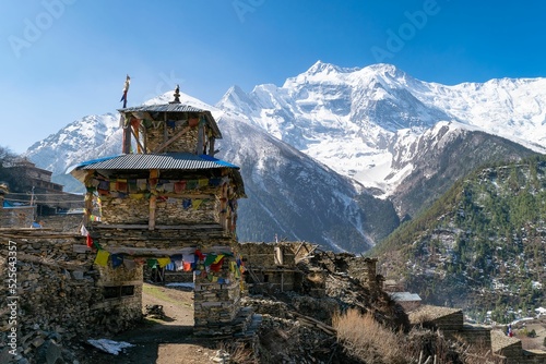 Entrance of Upper Pisang village with Annapurna II mountain, Annapurna circuit trek, Nepal photo
