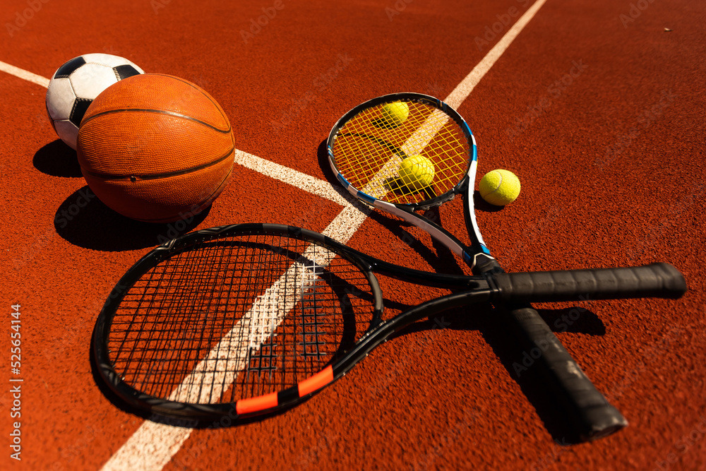 Close-up Of Various Sport Equipments On court Background