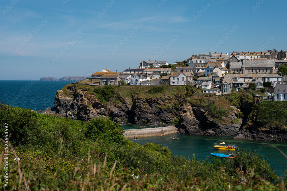 port isaac harbour cornwall england view of the coast of the region sea cottages houses boats water bay europe summer 