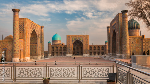 Vászonkép Traditional Uzbek religious architecture in Registon Square at sunrise, Samarkan