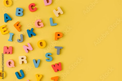 Wallpaper Mural Colorful letters of the alphabet on yellow background. Primary school or preschool, kindergarten. Educational game. Learning through play. Torontodigital.ca