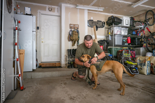 Marine veteran with service dog and family living life.