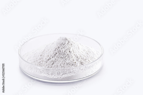 Phosphate, pile of phosphorous powder, used as a fertilizer or compost, for soil correction, or phosphating. Isolated background with copyspace photo