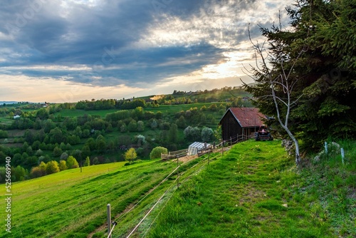 Beautiful view of a green landscape in Hrinovske Lazy of Slovakia in the time of sunset photo