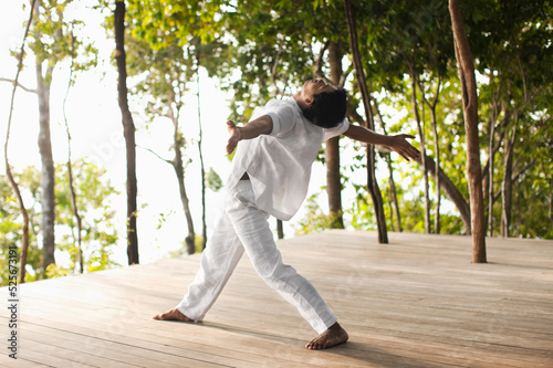 Man Practicing Tai Chi. Yao Noi, Koh Yao Noi, Thailand. photo