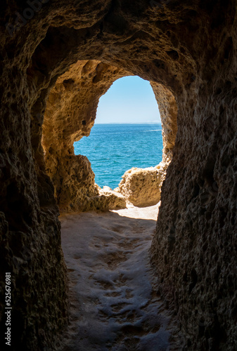 The Doll (A Boneca), the most famous viewpoint of Carvoeiro, two eroded archs with views out over the deep blues of the ocean. The natural caves exists in Algar Seco, Algarve - Portugal