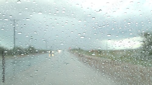 Driving During Rainstorm Flooded Streets From Inside Car Windshield Wipers Working