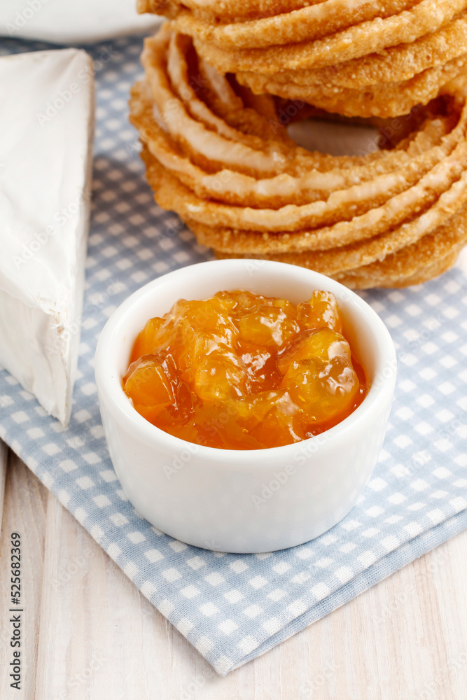 Bowl of peach jam on the breakfast table. Bowl of peach jam on the breakfast table.