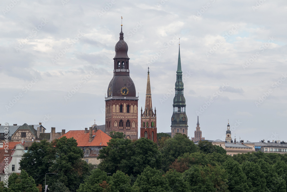 View of Old Riga with 3 church towers. Dome Church, Anglican Church and St. Peter's Church can be seen