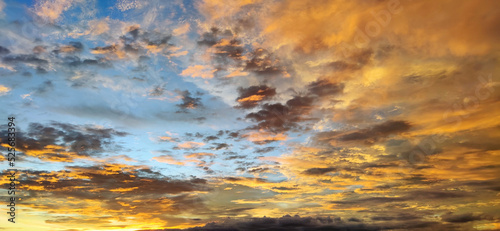 Fototapeta Naklejka Na Ścianę i Meble -  Dramatic background of a cloudy sky at sunset