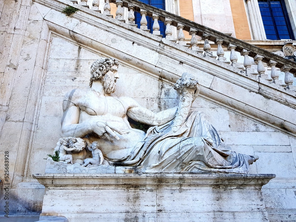 Bas-relief of Neptune on an ancient building in Rome