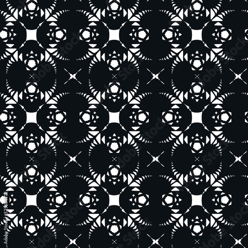 Geometric difficult black and white pattern. Floral seamles vector. One-color embroidery with elements of geometric shapes. Monochrome kaleidoscope
