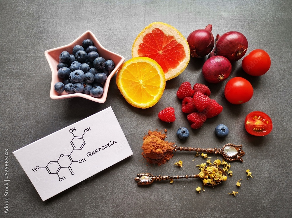 Structural chemical formula of quercetin molecule with fresh fruit and