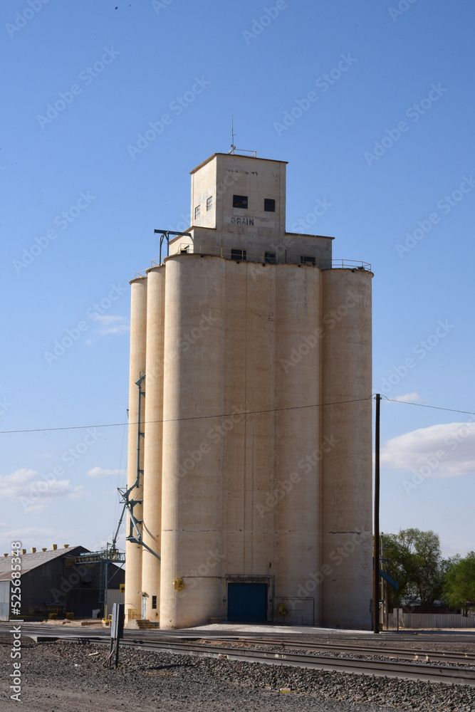 Old grain bin silos holding commodity crops and grains Old grain bin silos holding commodity crops and grains