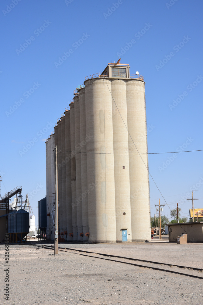 Old grain bin silos holding commodity crops and grains