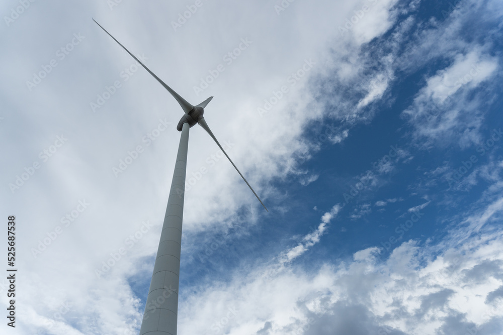 wind turbine on a background of grey clouds wind turbine on a background of grey clouds