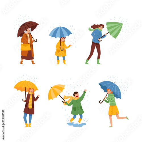 People walking under umbrella on autumn rainy and windy day set. Men and women wearing warm clothes walking under rain cartoon vector illustration