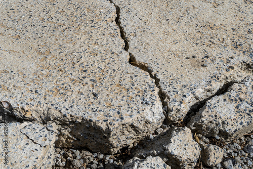 cracked asphalt dryness, texture, pebbles