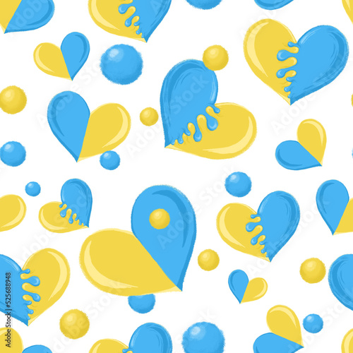 Seamless pattern with blue and yellow hearts photo