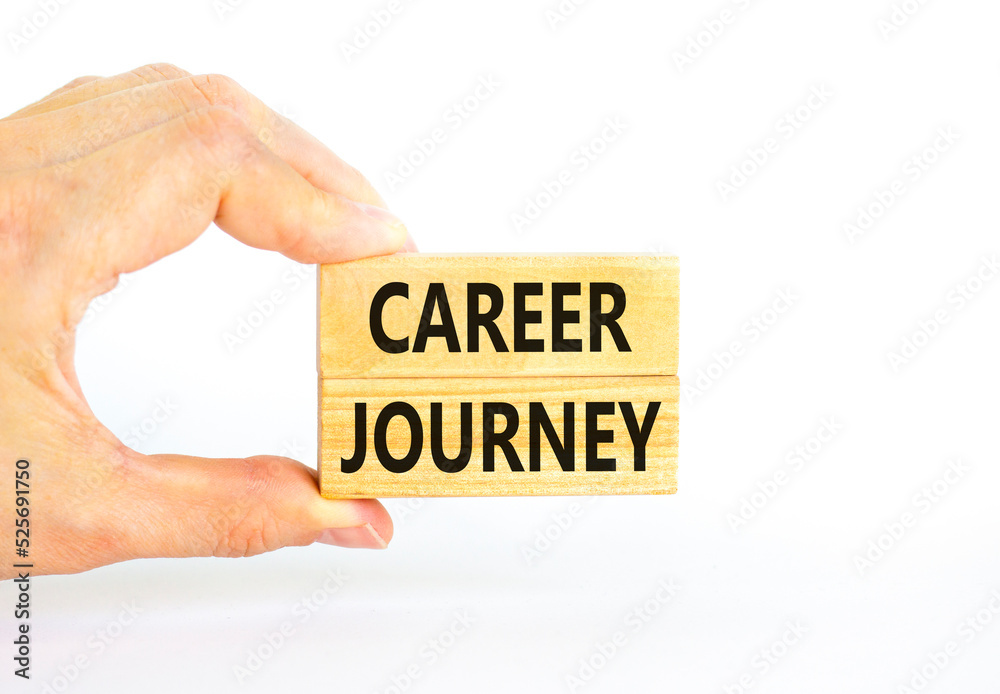 Career journey symbol. Concept words Career journey on wooden blocks on a beautiful white table white background. Businessman hand. Business Career journey concept. Copy space. Career journey symbol. Concept words Career journey on wooden blocks on a beautiful white table white background. Businessman hand. Business Career journey concept. Copy space.