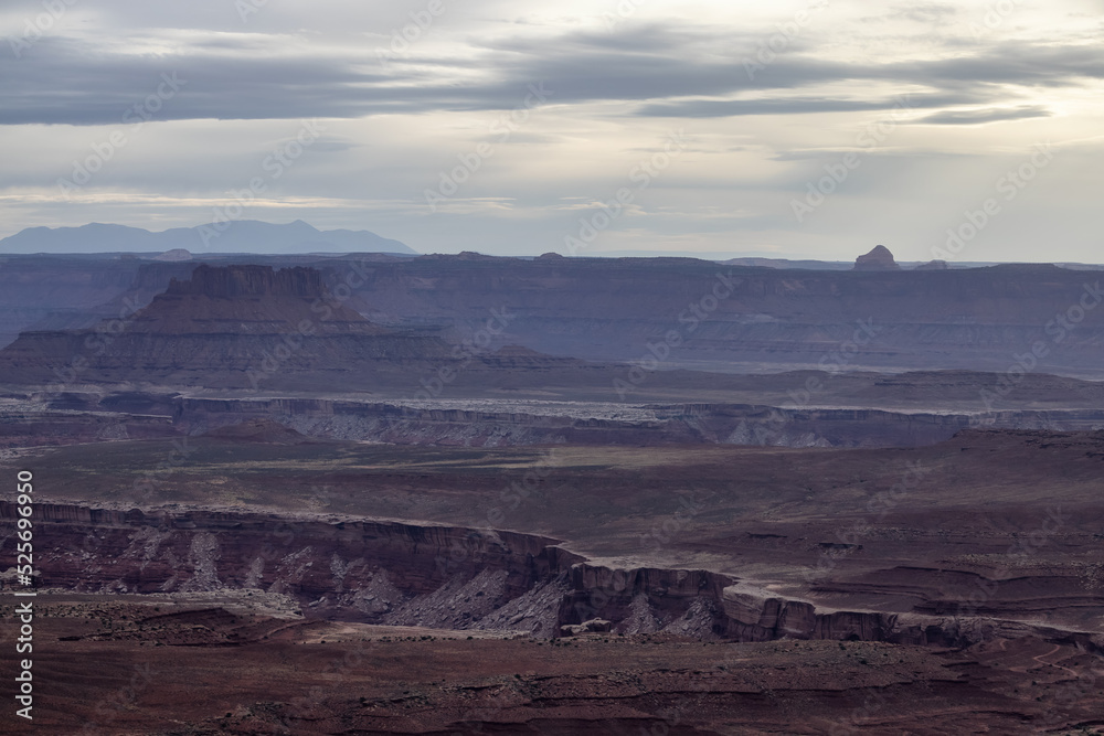 Scenic American Landscape and Red Rock Mountains in Desert Canyon. Spring Season. Canyonlands National Park. Utah, United States. Nature Background. Sunset