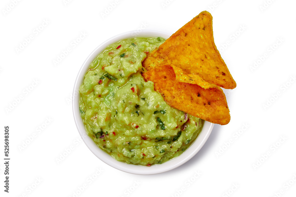 Bowl of guacamole with dipped nachos on white Bowl of guacamole with dipped nachos on white