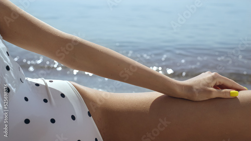 Photography Sexy girl posing beach wearing polka dot swimsuit closeup