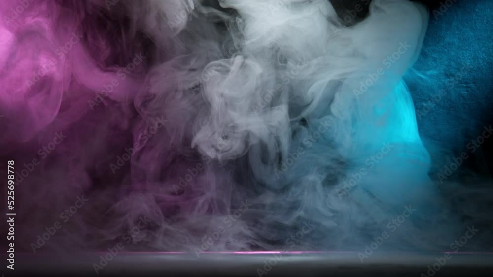 Super Slow Motion Shot of Atmospheric Neon Smoke Abstract Color Background at 1000fps. Super Slow Motion Shot of Atmospheric Neon Smoke Abstract Color Background at 1000fps.