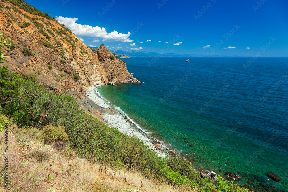 Panoramic view of pebble wild beach on mount Ayu-dag near Partenit. Alushta district, Crimea, Ukraine.