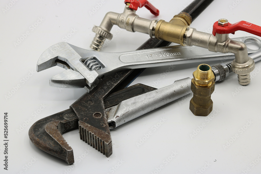 set of tools for plumber on a white background set of tools for plumber on a white background