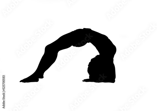 Silhouette of woman practicing yoga 