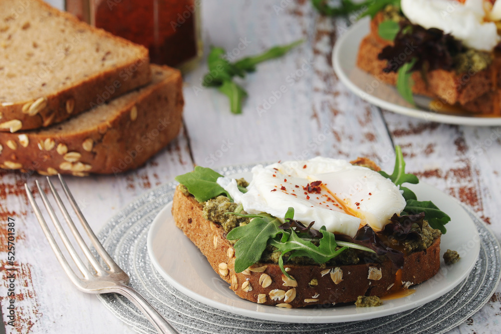 Homemade sandwiches with salmon, avocado and poached eggs Homemade sandwiches with salmon, avocado and poached eggs